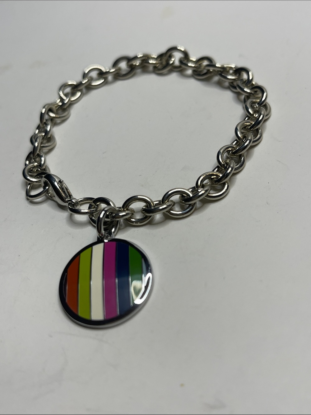 Coach Legacy Silver Chain Bracelet with Multicolor Striped Disc Charm